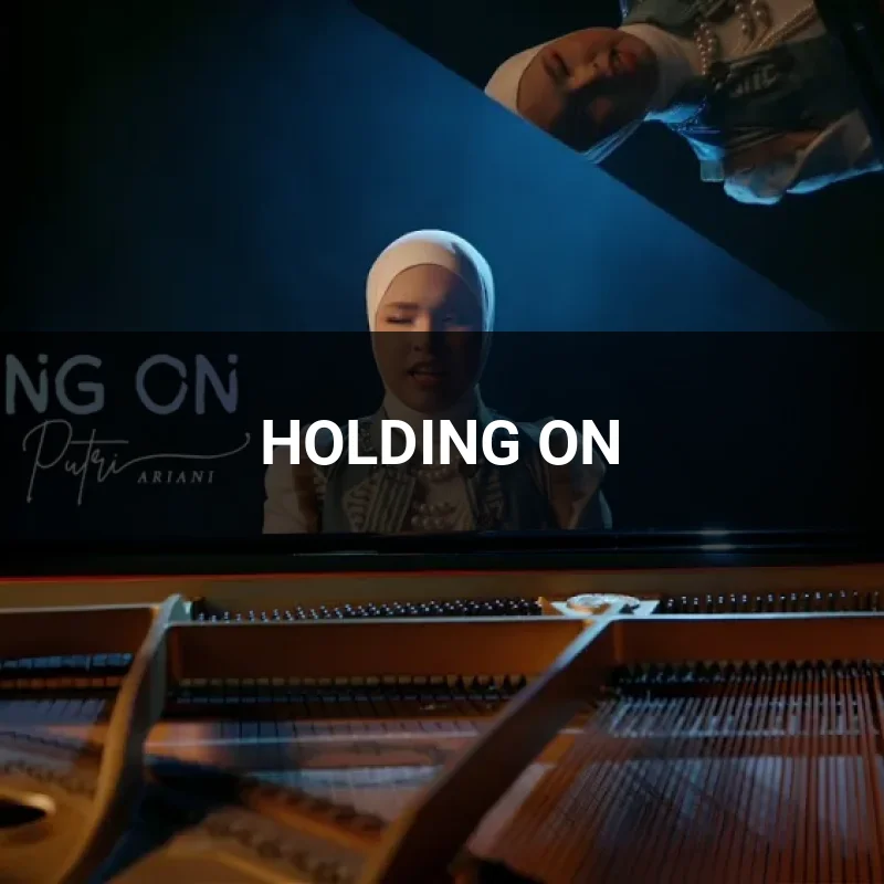HOLDING ON